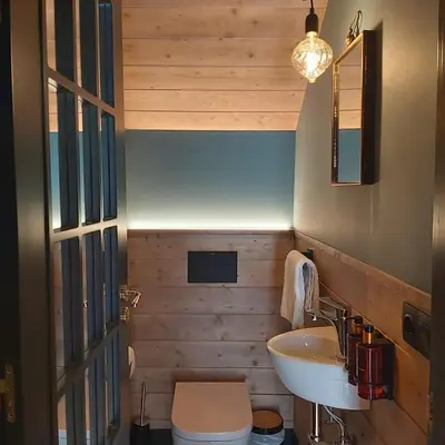 Un baño de Casa Sallent con bañera hidromasaje y jardín