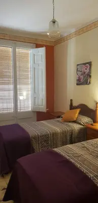 Cama o camas de una habitación en Piso romantico y espacioso