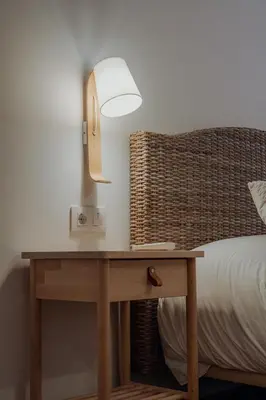 Cama o camas de una habitación en Apartamentos Destino Alquézar