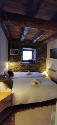 Cama o camas de una habitación en CABAÑA VENTO NORTE