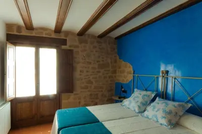 Cama o camas de una habitación en Casa Carmela