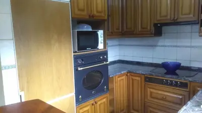 Una cocina o zona de cocina en Ático-Duplex Basa la Mora