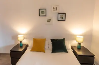 Cama o camas de una habitación en Anayet - Plaza del Reloj en FORMIGAL - by PIRINEOS 360
