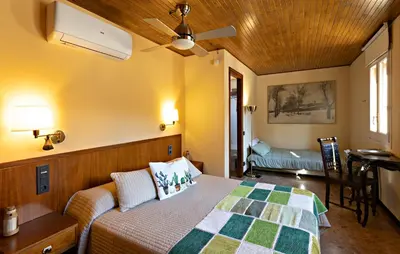 Cama o camas de una habitación en Hostal Victor