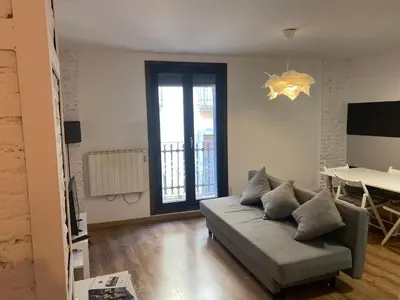 Una televisión o centro de entretenimiento en Apartamento Casa Latre