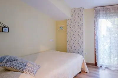 Cama o camas de una habitación en Casa rural MAZA especial grupos