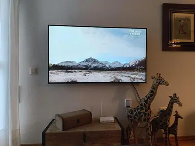 Una televisión o centro de entretenimiento en Inmocyma Cerler-Prados de Velarta C2 8 -vistas panorámicas
