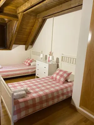 Cama o camas de una habitación en La Buhardilla de Sofía