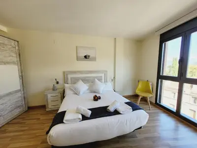 Cama o camas de una habitación en Guest House Ainsa Pirineos