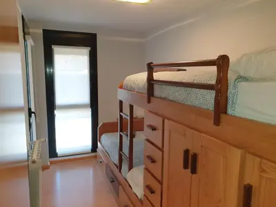 Cama o camas de una habitación en Apartamento Vive Jaca