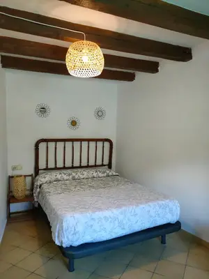 Cama o camas de una habitación en Lo Raconet