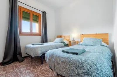 Cama o camas de una habitación en Casa el Ferrer