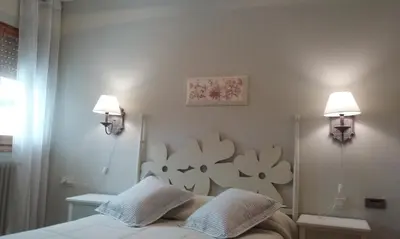 Cama o camas de una habitación en apartamento Valles Blancos 3-6
