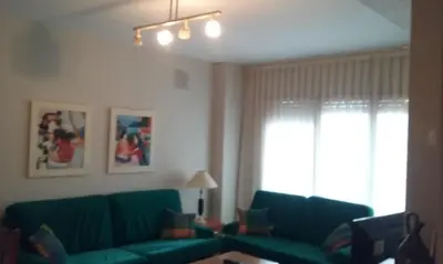 Zona de estar de apartamento Valles Blancos 3-6