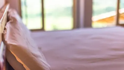Cama o camas de una habitación en Eco-Apartaments Cal Rossa de Taús