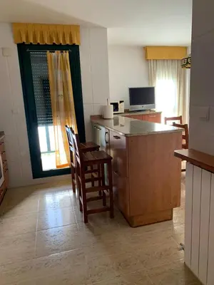 Una televisión o centro de entretenimiento en Apartamento Los Maños de Oroel