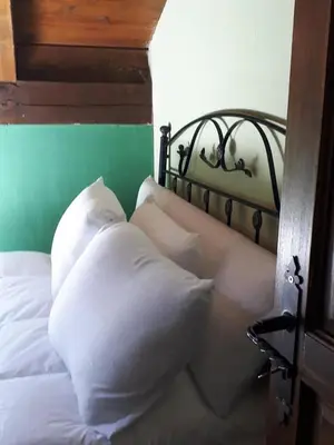 Cama o camas de una habitación en Albergue A'Noguera