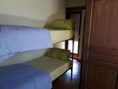 Cama o camas de una habitación en Albergue A'Noguera
