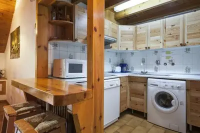 Una cocina o zona de cocina en Vielha centro duplex Sapporo