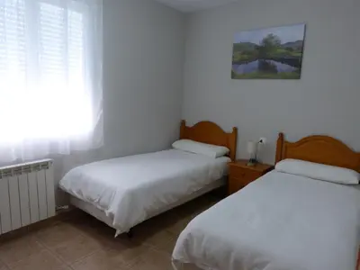 Cama o camas de una habitación en Casa MARIA VILLARROYA