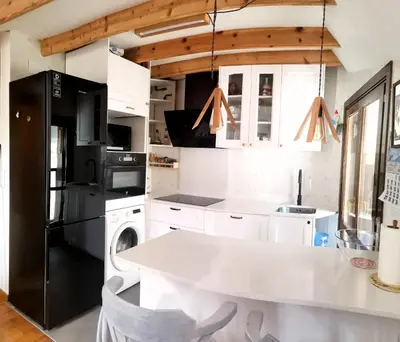 Una cocina o zona de cocina en Ático dúplex con vistas