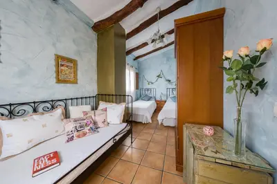 Cama o camas de una habitación en Casa rural lo Maset de Carmeta