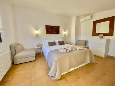 Cama o camas de una habitación en Mas de l'Aranyó - Eco Wellness Spa