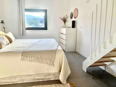 Cama o camas de una habitación en Àtic panoràmic a La Seu d'Urgell