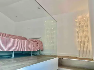 Cama o camas de una habitación en Àtic panoràmic a La Seu d'Urgell