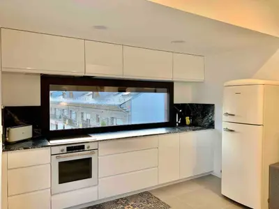Una cocina o zona de cocina en Àtic panoràmic a La Seu d'Urgell