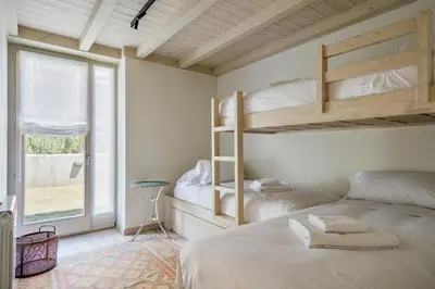 Cama o camas de una habitación en Luderna - Apartamento con jardín Bela