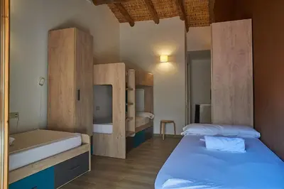 Cama o camas de una habitación en Lo Molí de Bot