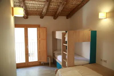 Cama o camas de una habitación en Lo Molí de Bot