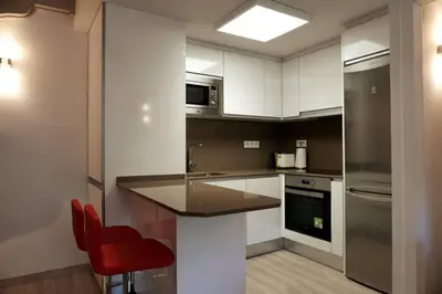 Una cocina o zona de cocina en Ático Pico Cerler