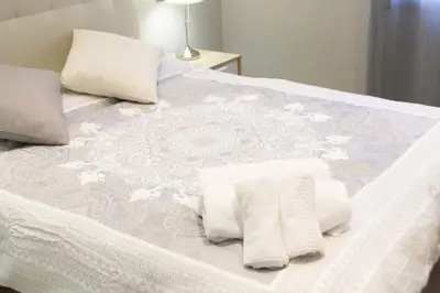 Cama o camas de una habitación en Apartamenticos Plaza Las Armas