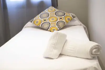 Cama o camas de una habitación en Apartamenticos Plaza Las Armas