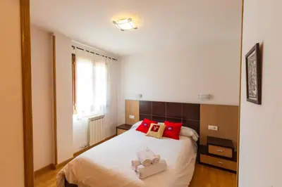 Cama o camas de una habitación en Partacua - Centro de Panticosa con garaje y trastero - Pirineos360
