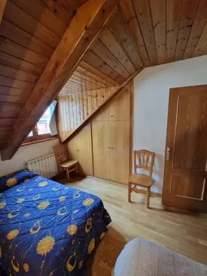 Cama o camas de una habitación en Espot Natura - Apartament de muntanya al PN Aigüestortes i Sant Maurici