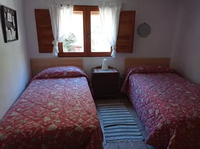 Cama o camas de una habitación en Casa Flor de lis