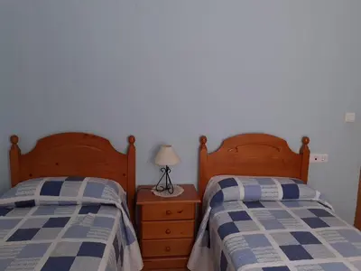 Cama o camas de una habitación en BIESCAS LAS PLACETAS