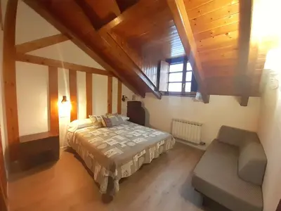 Cama o camas de una habitación en Apartamento Benasque Vistas al Sarrio