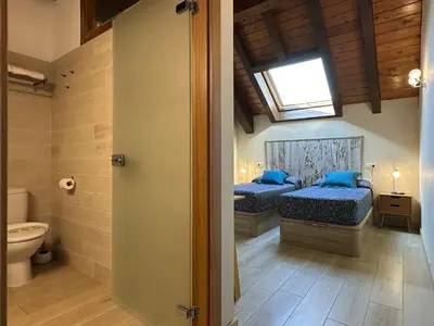 Cama o camas de una habitación en Hostal Iratibizkar