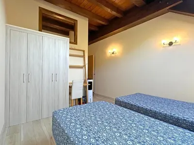 Cama o camas de una habitación en Hostal Iratibizkar
