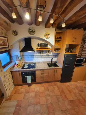 Una cocina o zona de cocina en La Ultima Casa Masboquera