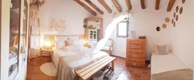 Cama o camas de una habitación en La Ultima Casa Masboquera