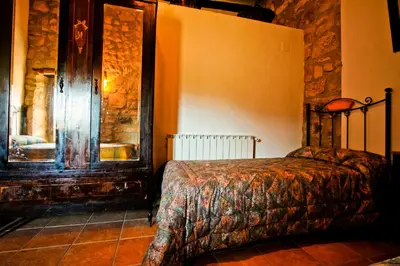 Cama o camas de una habitación en Masia Manonelles