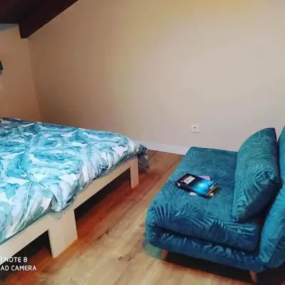 Cama o camas de una habitación en Acogedora casa rural en el centro de Navarra
