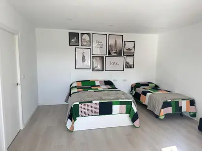 Cama o camas de una habitación en Hostal Vaticano