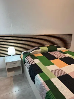 Cama o camas de una habitación en Hostal Vaticano