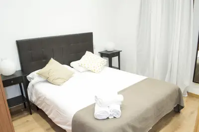 Cama o camas de una habitación en Apartamenticos Boggiero IV